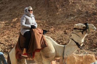 Granny in the desert without her rollers!